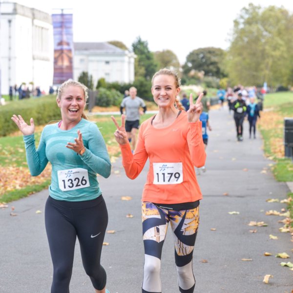 Two women running.